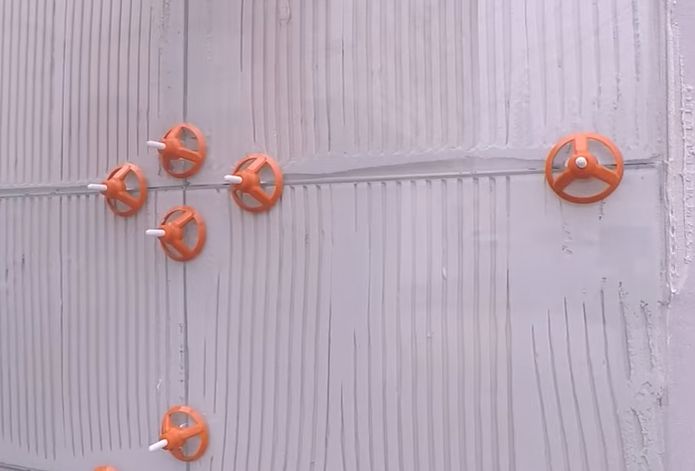 systemy wielokrotnego użytku do poziomowania płytek